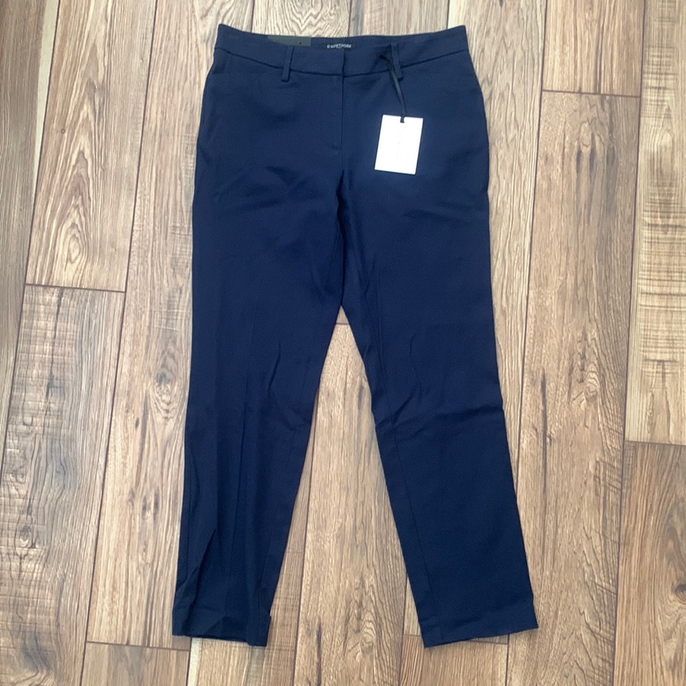 Trousers with adjustable hem